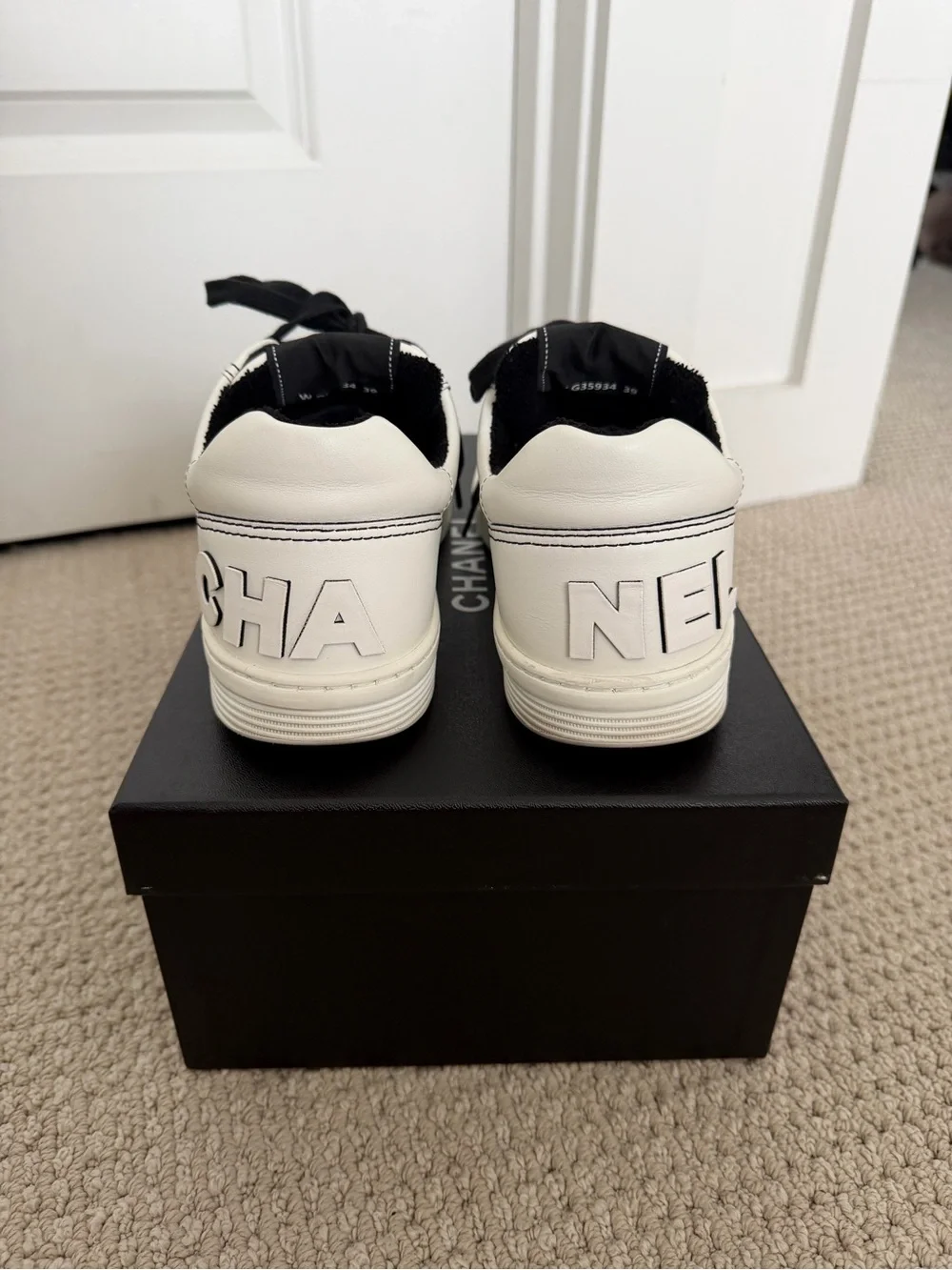 Chanel Women’s White/Black Leather Low-Top Sneakers